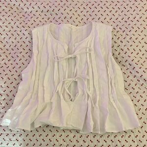 Women's White Open Tie Ruffle Sleeveless Top
Never Worn